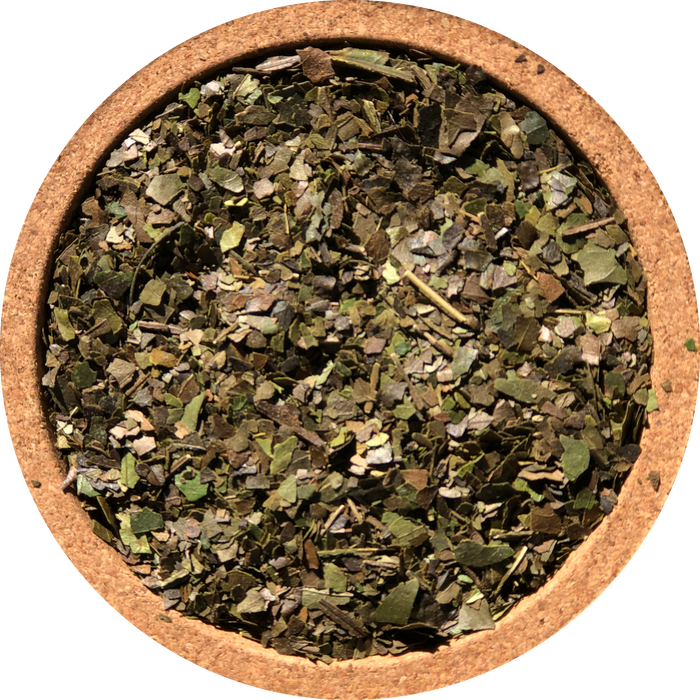 Pacha guayusa loose leaf in a clay bowl