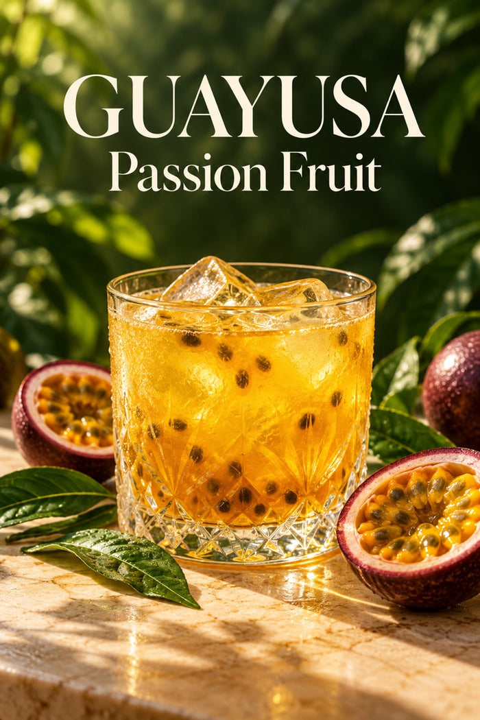 Glass of iced passion fruit guayusa with fresh ingredients and guayusa leaves